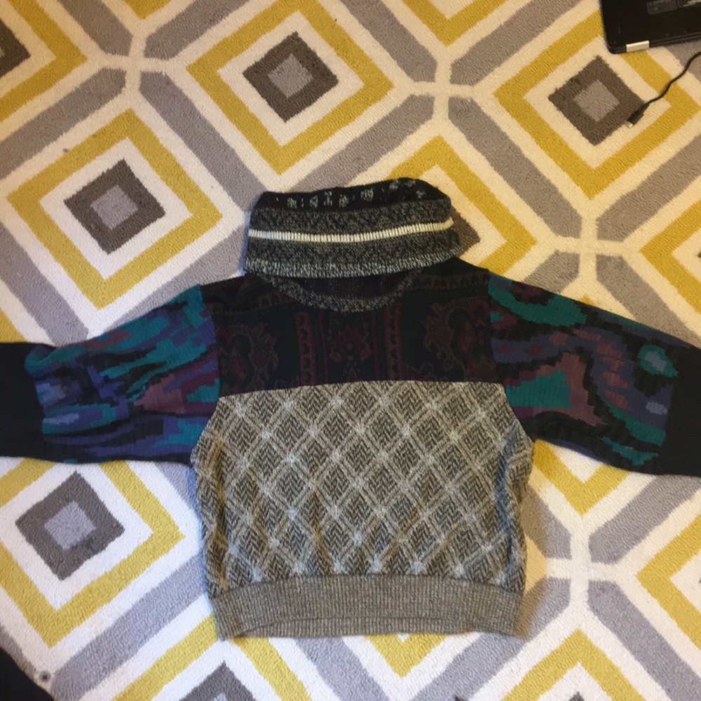 ‘Urban Renewal’ Turtle neck sweater.